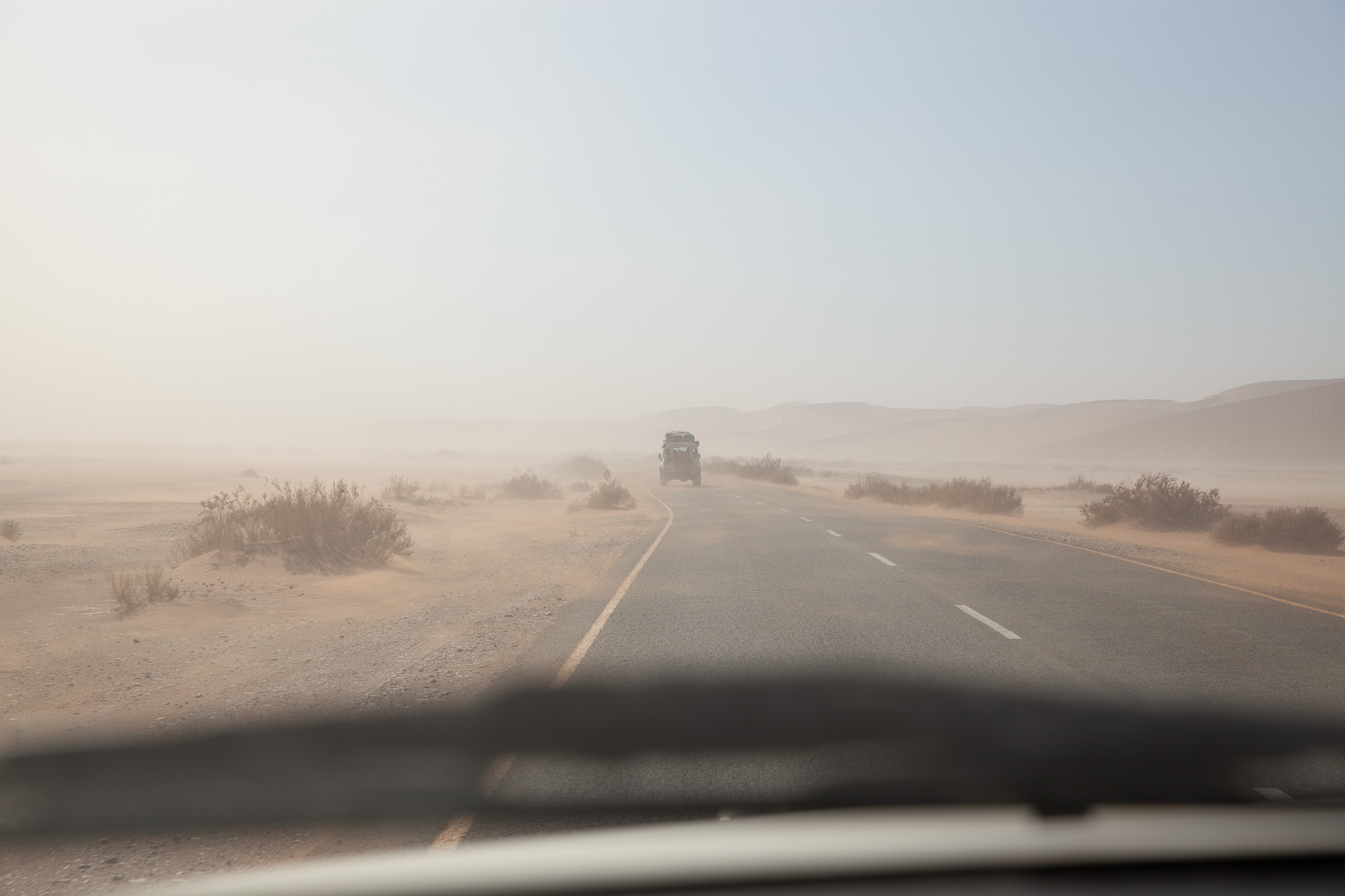 Car on the road, Namibia